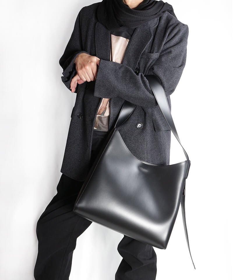 NIL DUE / NIL UN TOKYO ／ ニル デュエ / ニル アン トーキョー【 CURVED LEATHER TOTE BAG  (BLACK) 】- SIDEMILITIA inc.の通販サイト