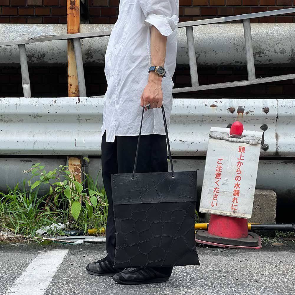 kagari yusuke（カガリユウスケ）の白壁シンプルトートバッグ - ショルダーバッグ